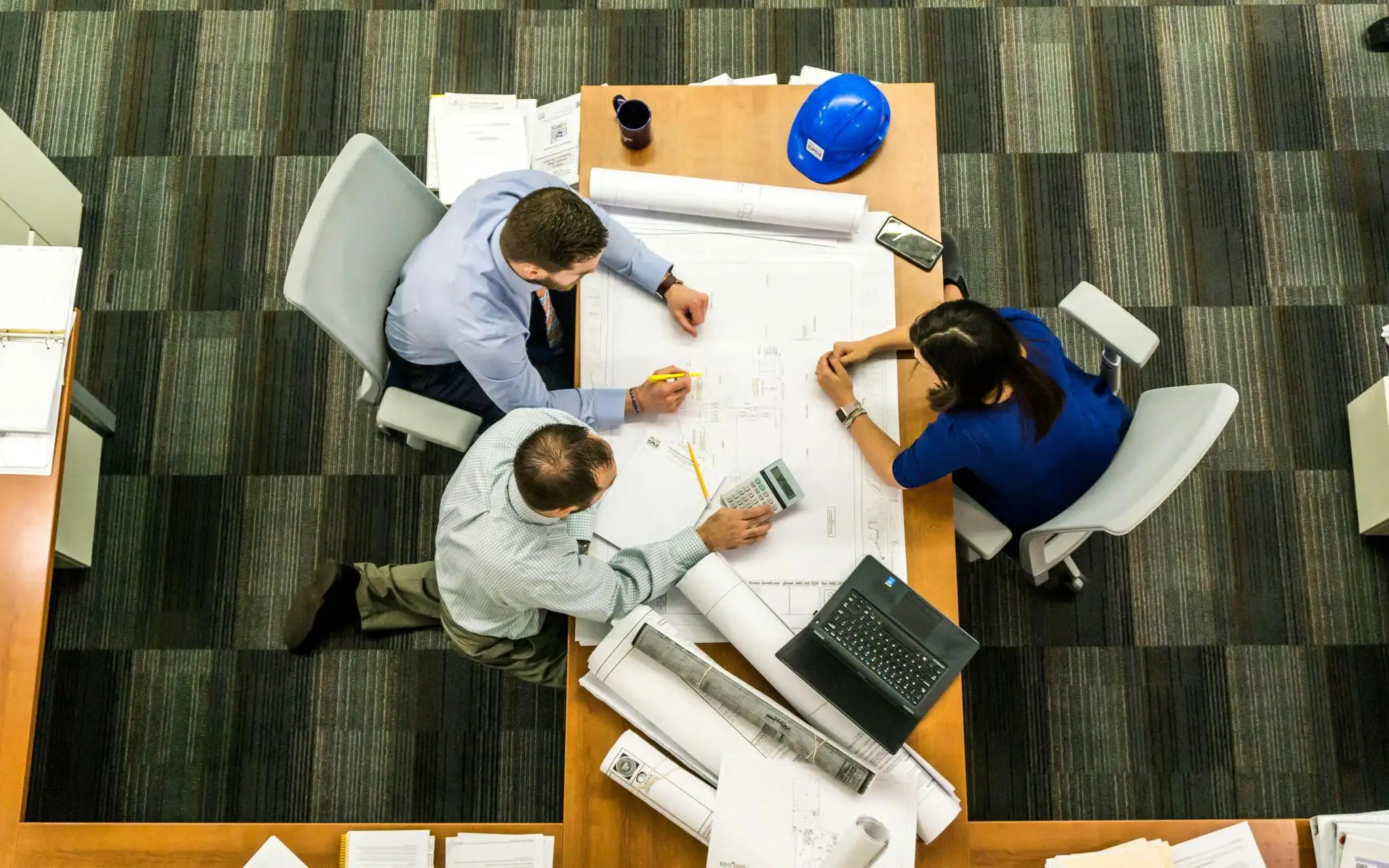 Product plans across a work table